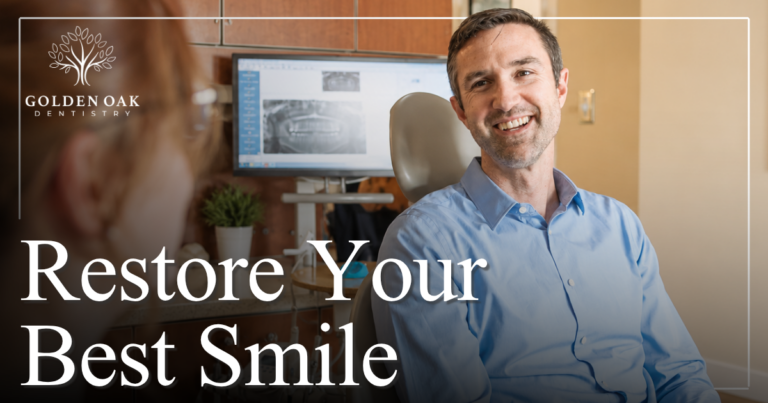 Restore Your Best Smile patient smiling at team member